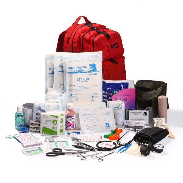 Red medical backpack with trauma dressings, first aid supplies, and tactical gear for emergency response