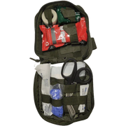 Compact tactical first aid kit with trauma supplies, scissors, and bandages for military or civilian use